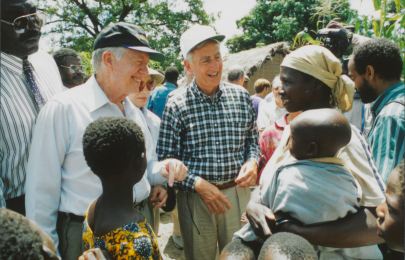 Former President Jimmy Carter and retired Merck CEO Roy Vagelos meet with people affected by river blindness