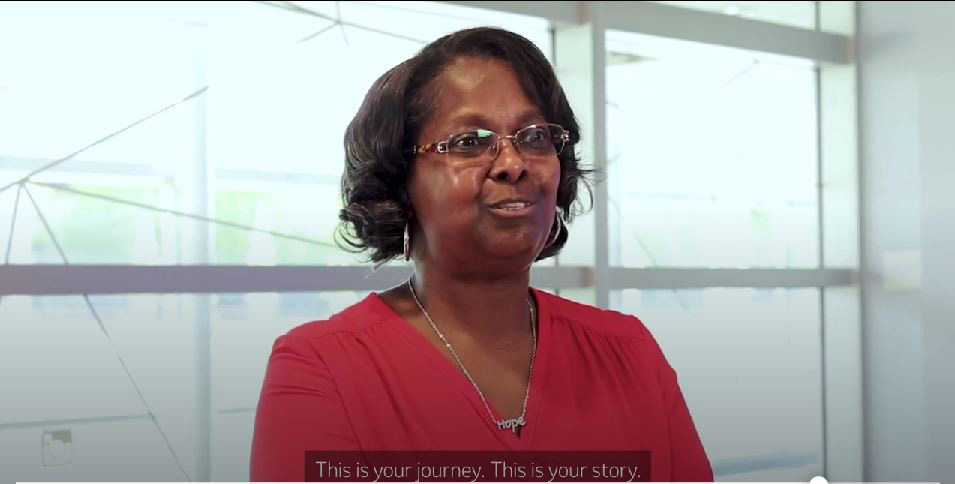 portrait of women in orange shirt