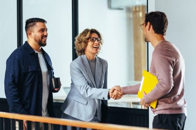man and woman shaking hands