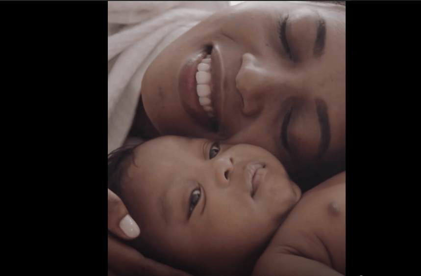 mother with child laying down