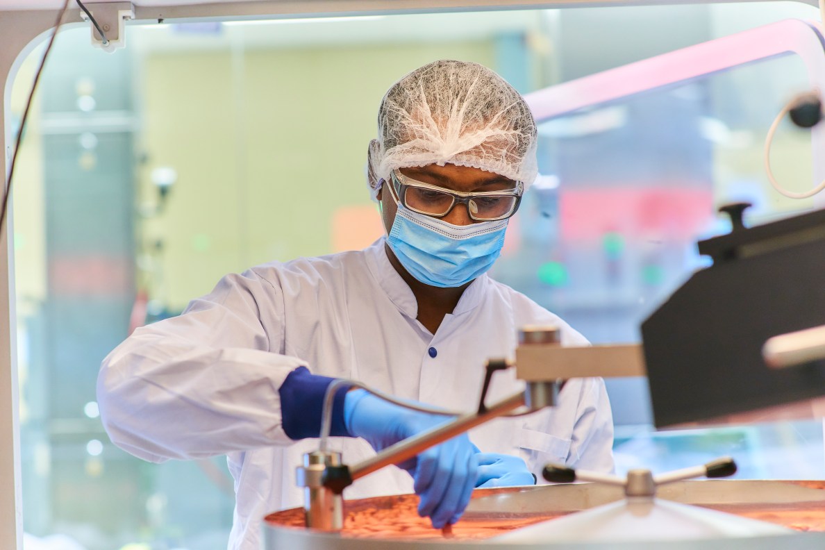 scientist wearing protective gear in lab