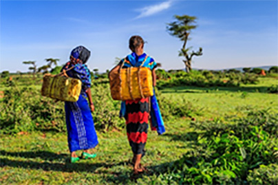 two women walking 404x269