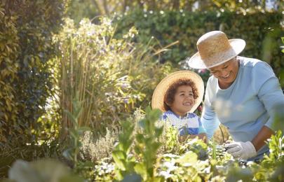 woman-child-field-of-flowers