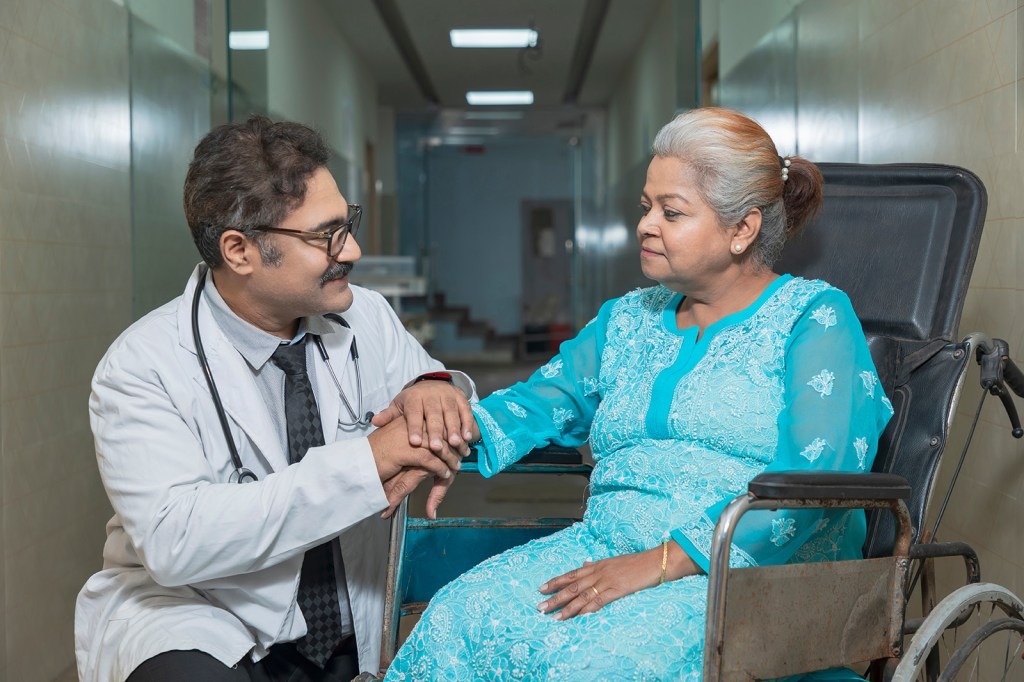 Dr. consulting with patient